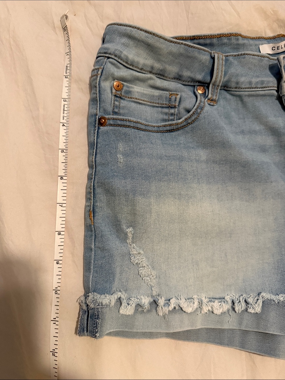 Celebrity Pink Light Wash Distressed Jean Shorts